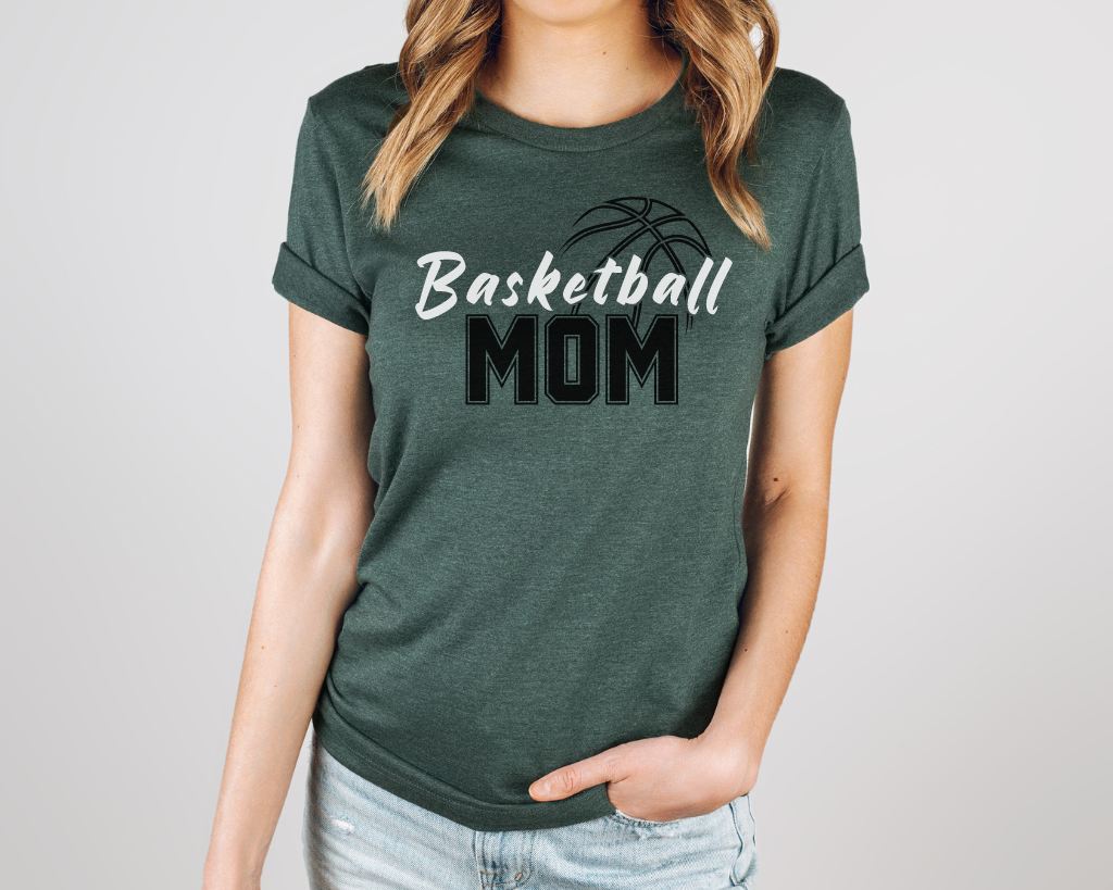 Green basketball mom shirt with 'Basketball' in white letters, 'Mom' in black letters, and a basketball outline above the word 'Basketball.