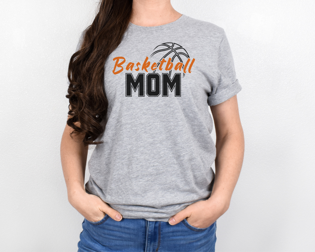 Light Gray basketball mom shirt with 'Basketball' in orange letters, 'Mom' in black letters, and a basketball outline above the word 'Basketball.