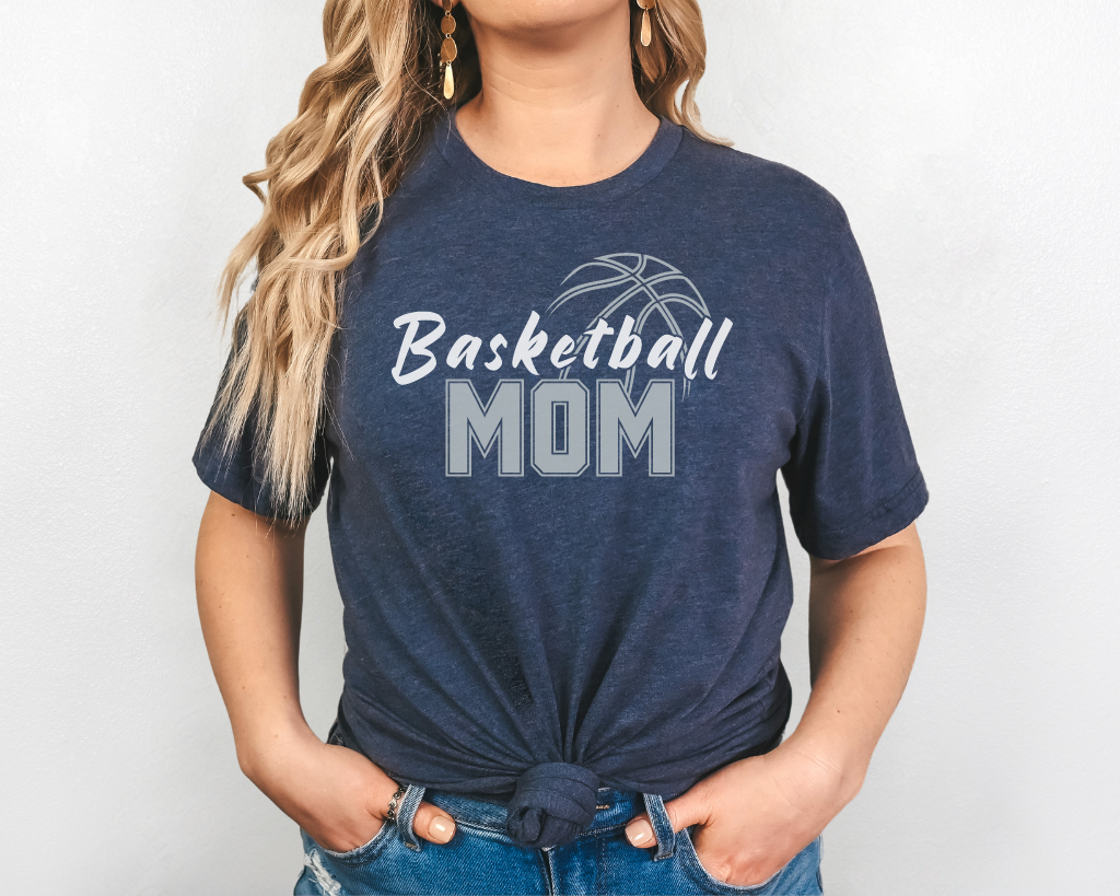 Navy basketball mom shirt with 'Basketball' in white letters, 'Mom' in silver letters, and a basketball outline above the word 'Basketball.