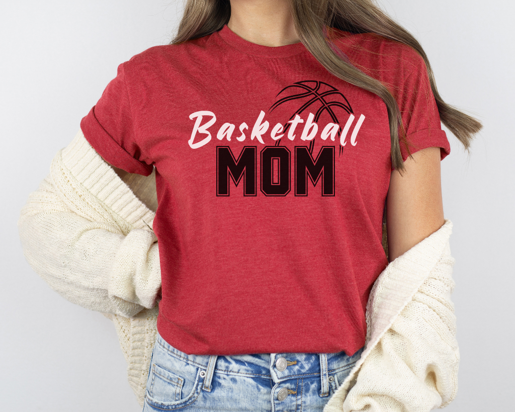 Red basketball mom shirt with 'Basketball' in white letters, 'Mom' in black letters, and a basketball outline above the word 'Basketball.