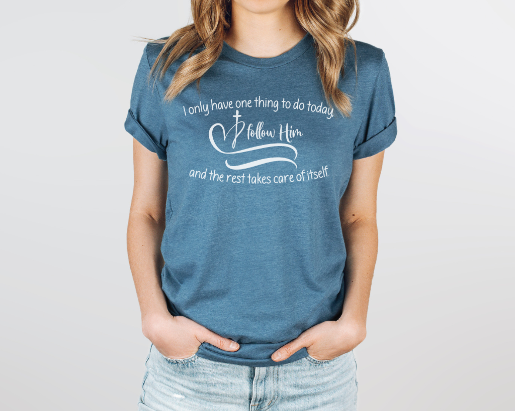 Christian teal shirt white lettering "I only have one thing to do today, follow him, and the rest takes care of itself" with white heart & cross