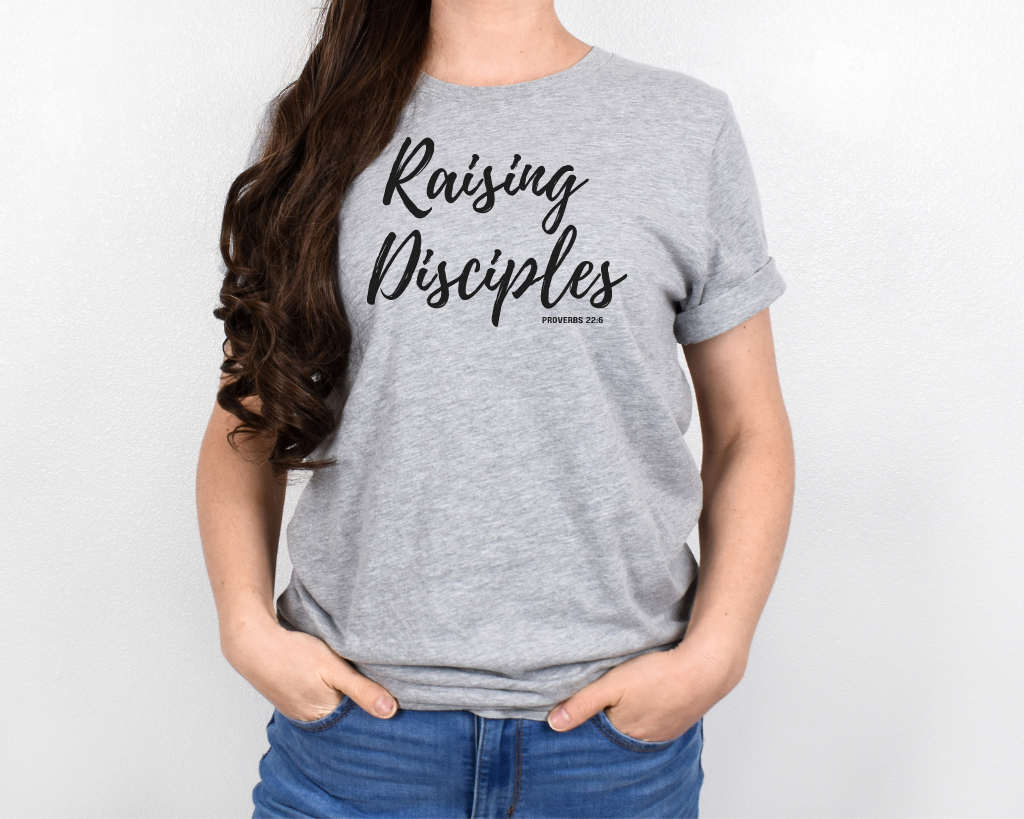 Christian light gray shirt black lettering "Raising Disciples" Proverbs 22:6